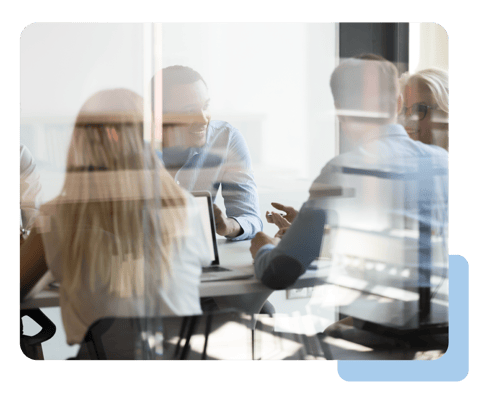 Group of professionals working in a conference room together
